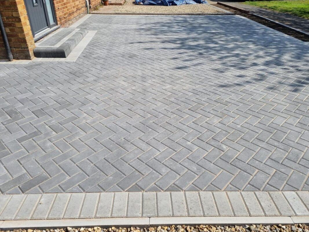 Completed grey herringbone block paving in Congleton